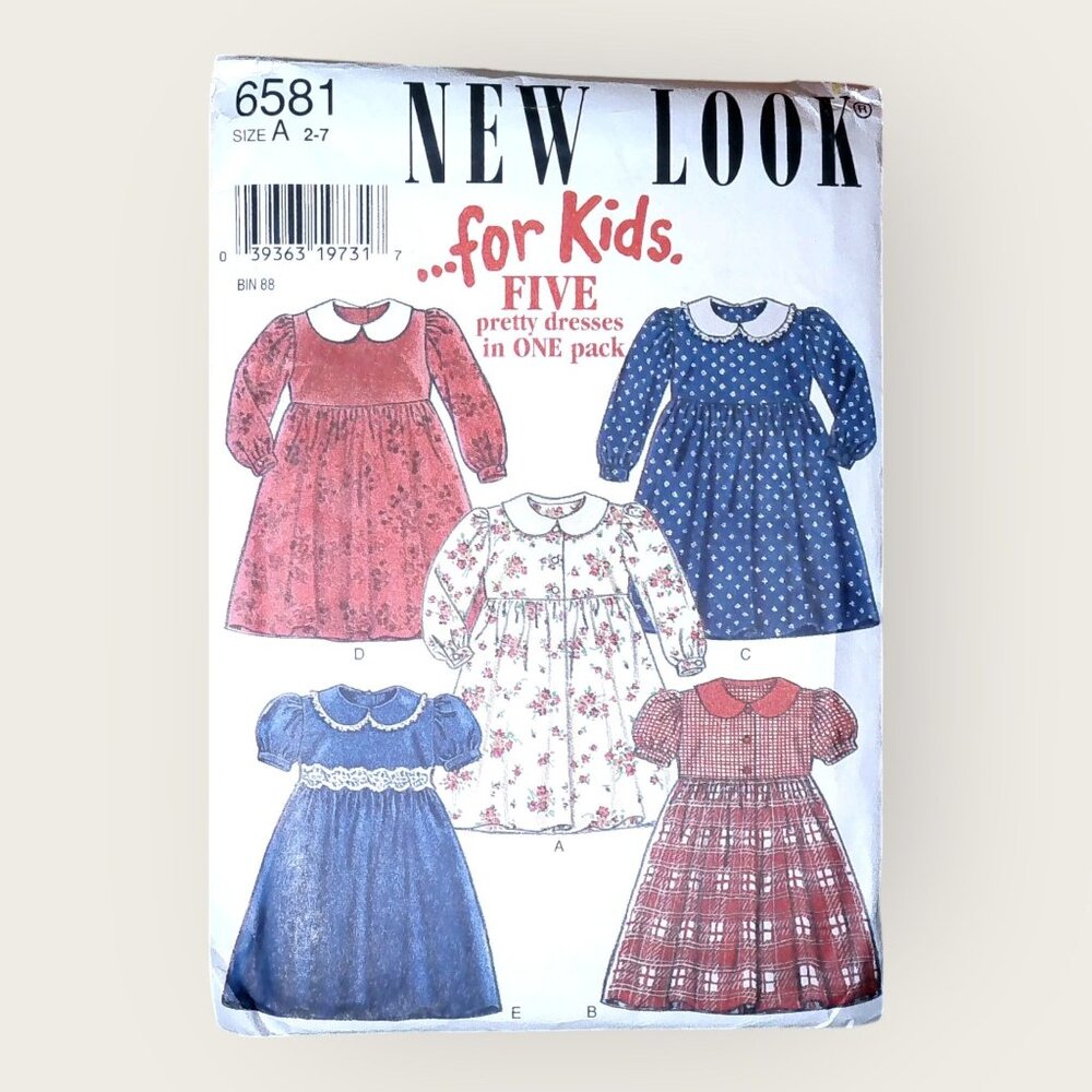 New Look Sewing Pattern 6581 Girls Dresses Size 2-7 Uncut Factory Folded